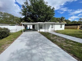 15901 W Bunche Park Dr in Opa Locka, FL - Building Photo