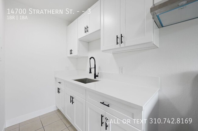 property at 14700 Strathern St