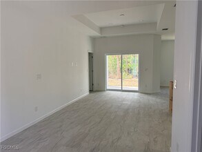 106 Moore Ave in Lehigh Acres, FL - Building Photo - Building Photo