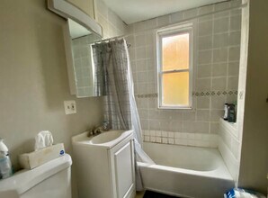 10 Bucknam St, Unit 1 in Boston, MA - Building Photo - Building Photo