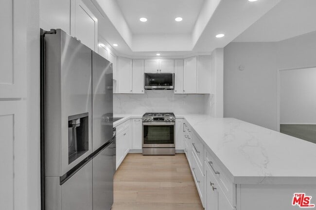 property at 4477 Woodman Ave