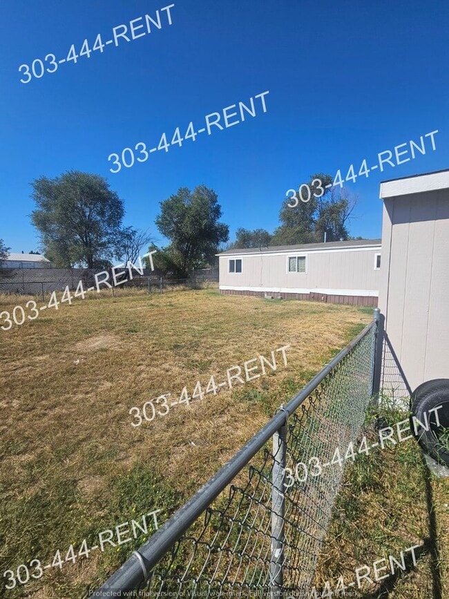 203 Oak St in Log Lane Village, CO - Building Photo - Building Photo