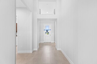 5709 Bristlecone Cmns in Westlake, FL - Building Photo - Building Photo