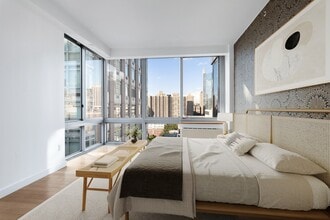 225-227 W 60th St in New York, NY - Building Photo - Building Photo