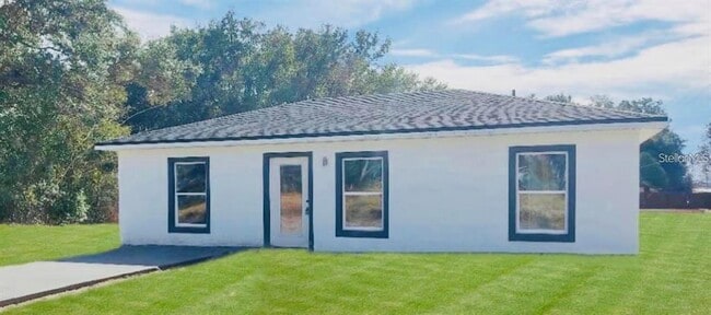 property at 5990 NW 6th Pl