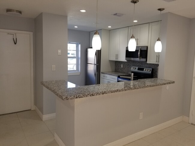 property at 14746 SW 90th Ter