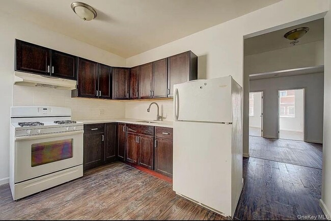 72-47 Metropolitan Ave