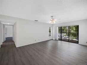 1965 SW Silver Pine Way in Palm City, FL - Building Photo - Building Photo