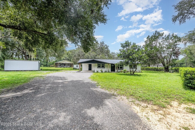 1895 Sugar Ln in Mims, FL - Foto de edificio - Building Photo