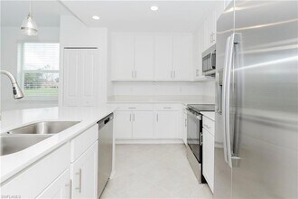 20910 Copperhead Dr, Unit 518 in Lehigh Acres, FL - Building Photo - Building Photo