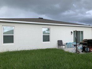 1216 SW Ermine Ave in Port St. Lucie, FL - Building Photo - Building Photo