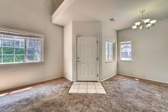 1445 S Chambers Rd in Aurora, CO - Building Photo - Building Photo