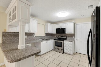 5070 Ponderosa Ln in Haverhill, FL - Building Photo - Building Photo