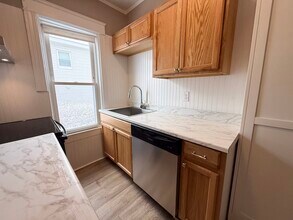 121 Mount Washington St, Unit 1st Floor in Lowell, MA - Building Photo - Building Photo