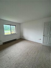 60 Davos Pointe in Woodridge, NY - Building Photo - Building Photo