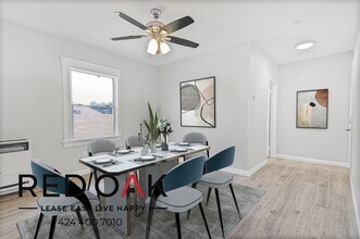 227 E 52nd St in Los Angeles, CA - Building Photo - Building Photo