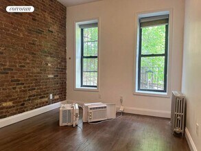 215 E 4th St in New York, NY - Building Photo - Building Photo