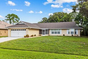 1799 SW Taurus Ln in Port St. Lucie, FL - Building Photo