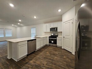 13703 Gunnison Grv Ave in Mustang Ridge, TX - Building Photo - Building Photo