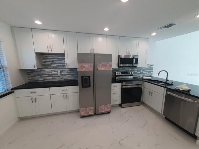 1847 Orange Blvd Way in Palm Harbor, FL - Building Photo - Building Photo