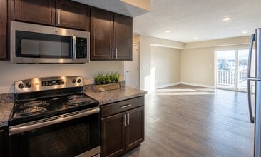 Alpine Apartment Homes in Comstock Park, MI - Building Photo - Building Photo