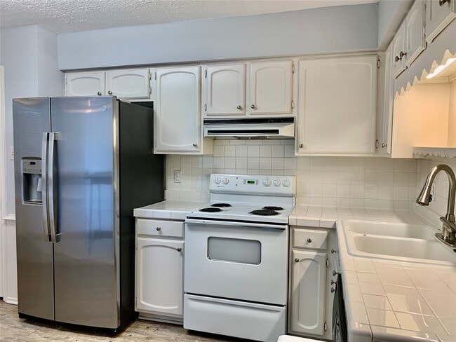 property at 374 N Post Oak Ln