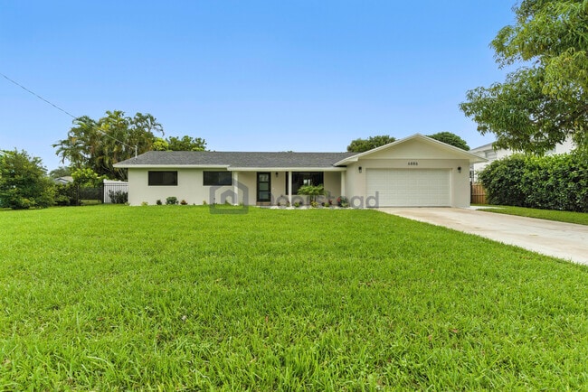 property at 6886 Tradewind Way