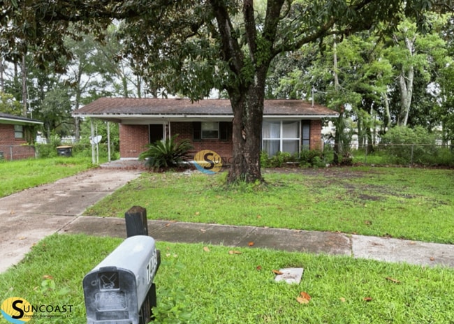 property at 7403 Sharbeth Dr N