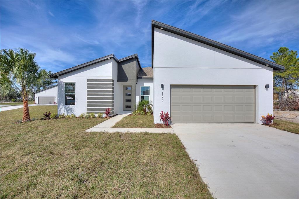 123 Tulip Ln in Poinciana, FL - Building Photo
