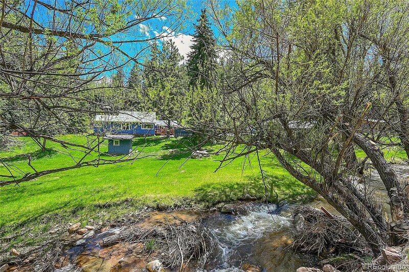 4910 County Hwy 73-Unit -Main House in Evergreen, CO - Building Photo