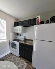 1664 Beach Blvd, Unit 37 in Biloxi, MS - Foto de edificio - Building Photo