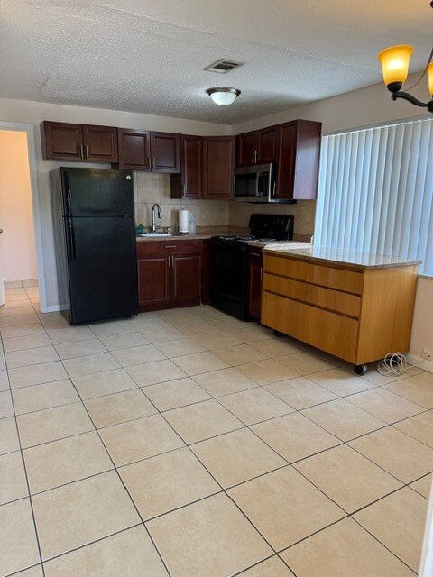 property at 5972 NW 19th St