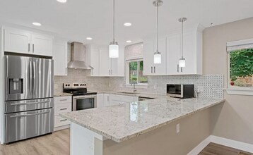 13777 W Asbury Cir in Lakewood, CO - Building Photo - Building Photo