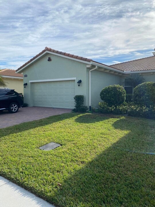 24061 SW Firenze Wy in Port St. Lucie, FL - Building Photo