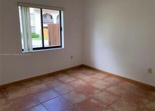 8977 SW 123rd Ct, Unit 107 in Miami, FL - Building Photo - Building Photo