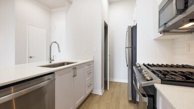 Versailles in Woodland Hills, CA - Building Photo - Building Photo