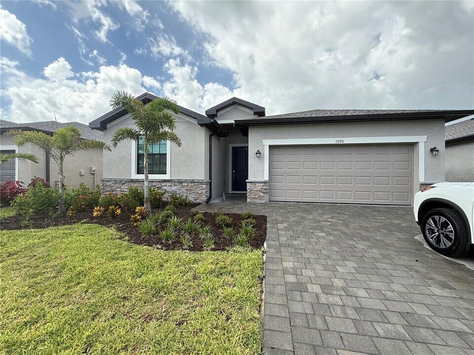 1590 Saddlewood Cir in Port Charlotte, FL - Building Photo