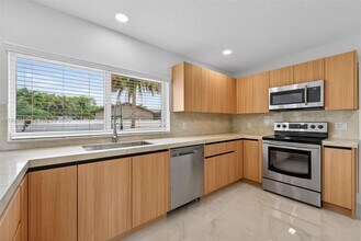 8695 SW 51st Pl in Cooper City, FL - Building Photo - Building Photo