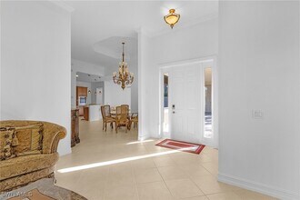 5030 Rustic Oaks Cir in Naples, FL - Building Photo - Building Photo