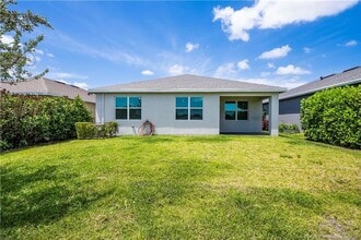 2730 NE Breezeway Cir in Ocean Breeze, FL - Building Photo - Building Photo