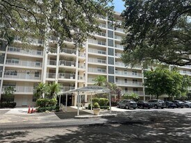 3520 Oaks Way, Unit 407 in Pompano Beach, FL - Building Photo