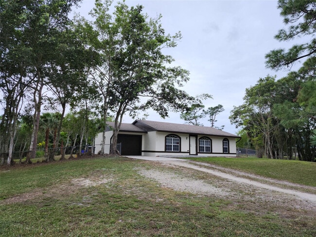 18142 Murcott Blvd in The Acreage, FL - Building Photo - Building Photo