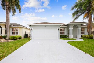1209 Olympic Cir in Greenacres, FL - Building Photo