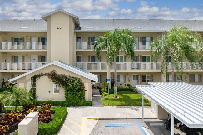 Village on Lake Augusta in Estero, FL - Building Photo - Building Photo