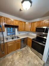 1800 Douglas Ave, Unit 104 in North Providence, RI - Building Photo - Building Photo