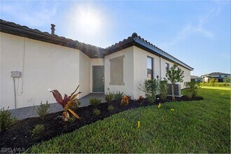 19573 Hinkley Dr in Estero, FL - Building Photo - Building Photo