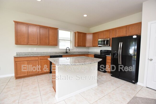 8914 Hinsdale Heights Dr in Polk City, FL - Building Photo - Building Photo