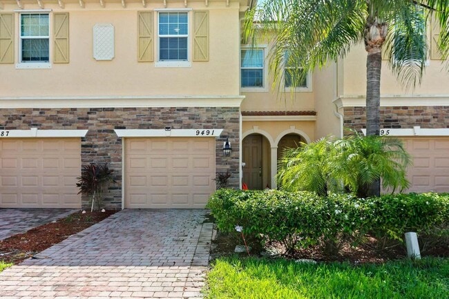 property at 9491 SW Merlin Ct