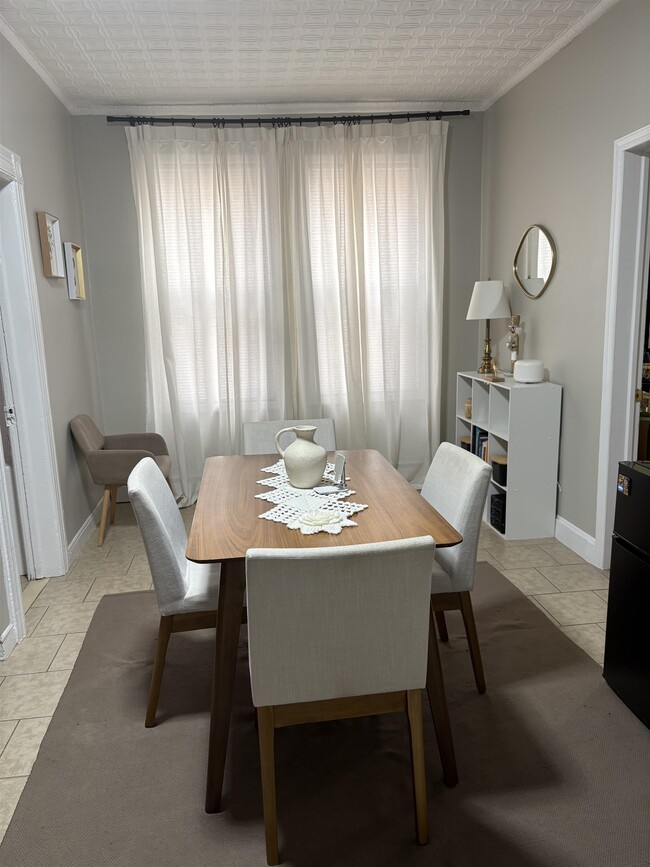 property at 121-123-123 W 25th St