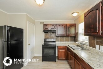 10306 Oakland Ave in Kansas City, MO - Foto de edificio - Building Photo